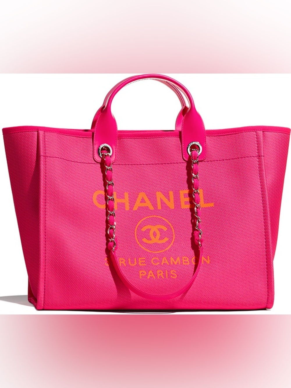 CHANEL Deauville Hot pink mixed fibers shopping tote.